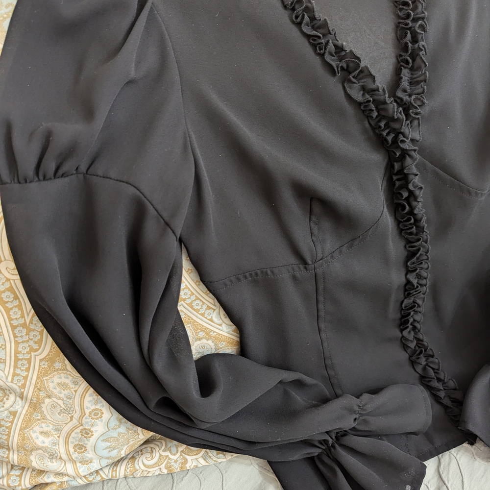 Elegant Black Ruffled Blouse
